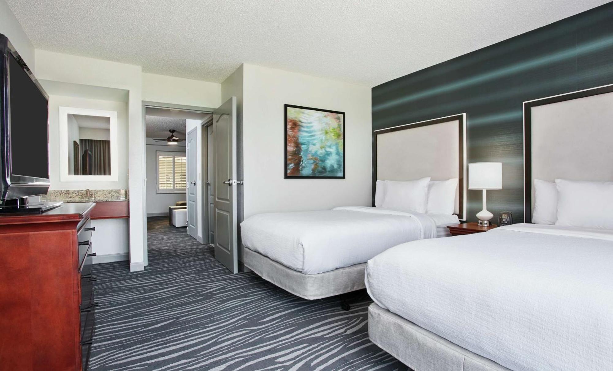 One-Bedroom Suite with Two Double Beds and One Sofa Bed